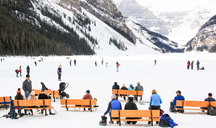 View of people enjoying skating on Lake Louise