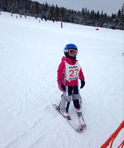 The author's daughter enjoying skiing in Ski Cooper Ski Area