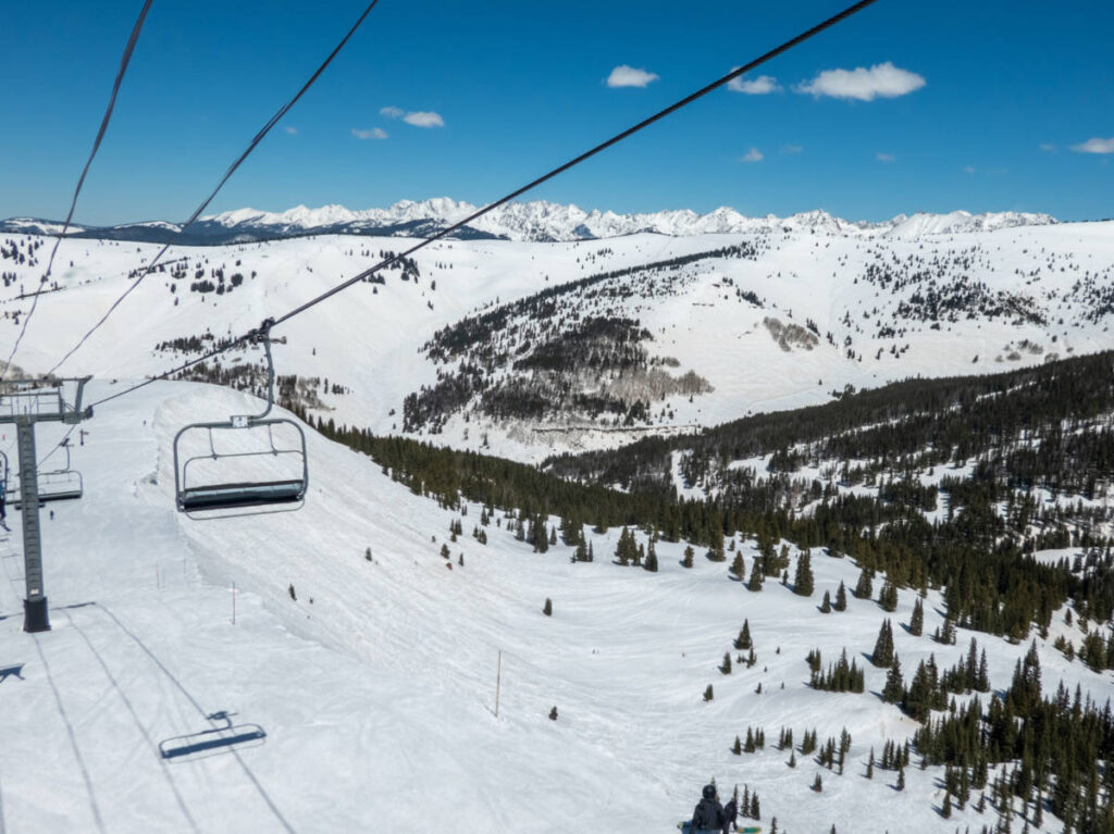 Overlooking view of the snow covered Vail Ski Resort from the ski lift