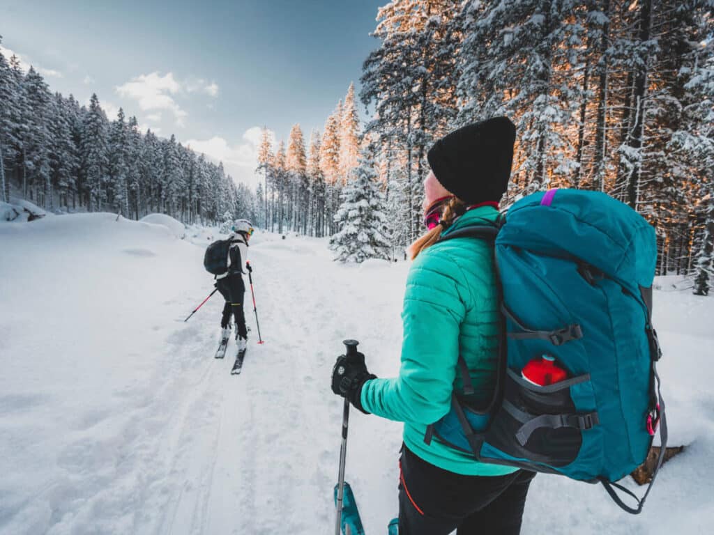 A woman ski walking during winter season