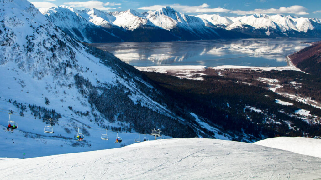 View of the ski-lift at Alyeska with the Kenai Mountains and Turnagain Arm behind in winter