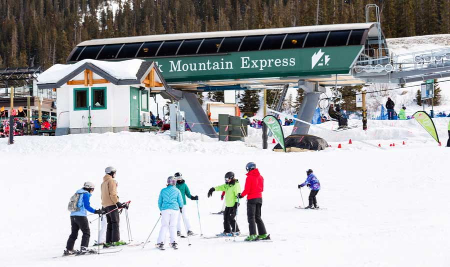 People enjoying skiing in Arapahoe Basin Ski Area