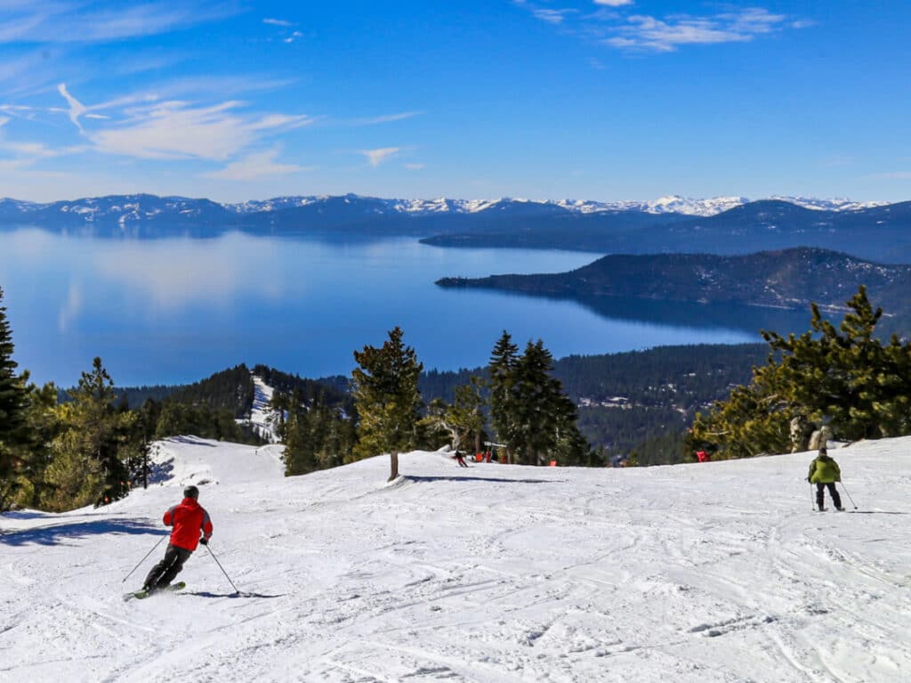 View of the skiers with an overlooking view of the Lake Tahoe