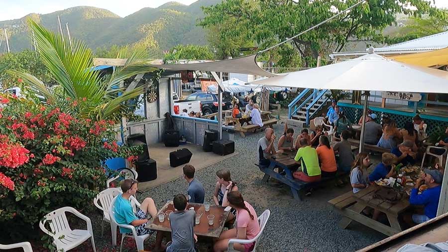 People enjoying their meal in the patio of Skinny Legs