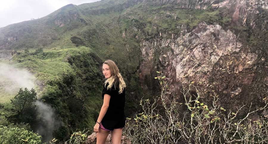 The author with an amazing mountain view on her background