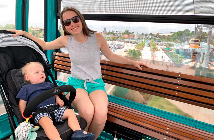 The author with her son on a Skyliner in Disney World