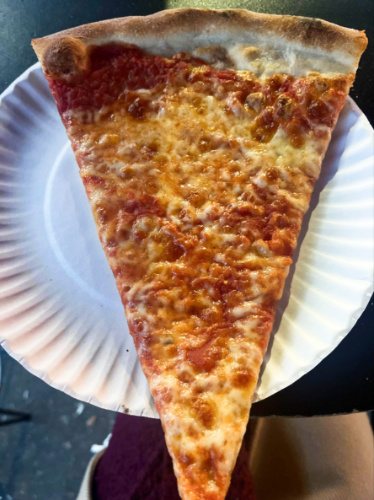 A slice of plain pizza from Joe’s Pizza