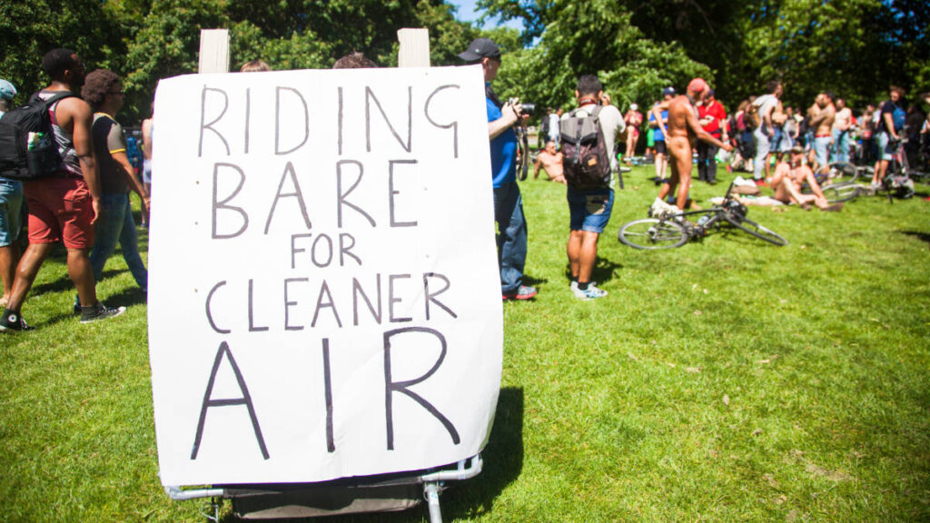 View of the "Riding Bare for a Cleaner Air" written on paper at Portland’s World Naked Bike Ride