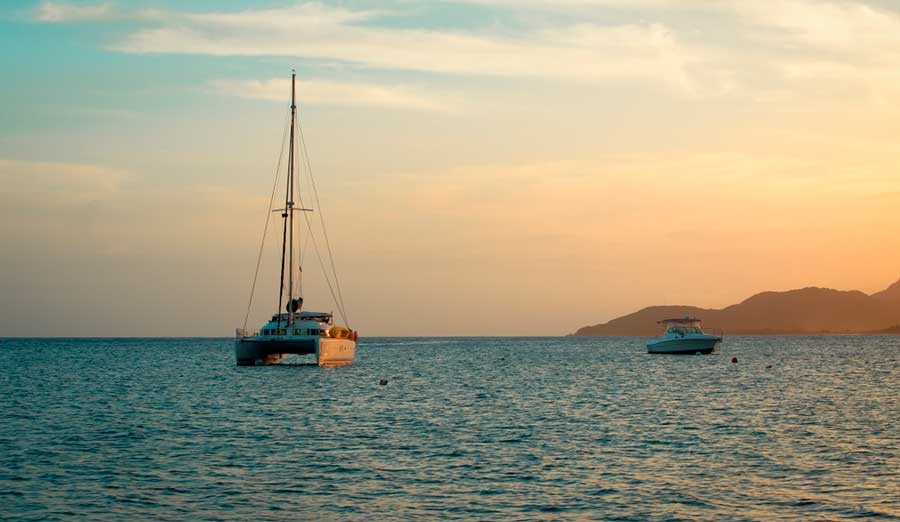 View of small boats during sunset in Catamaran