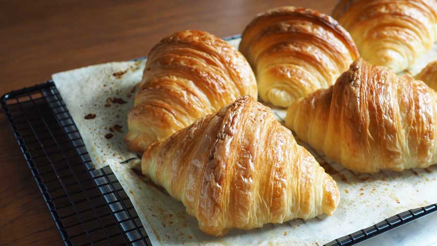 Baked croissants on a table