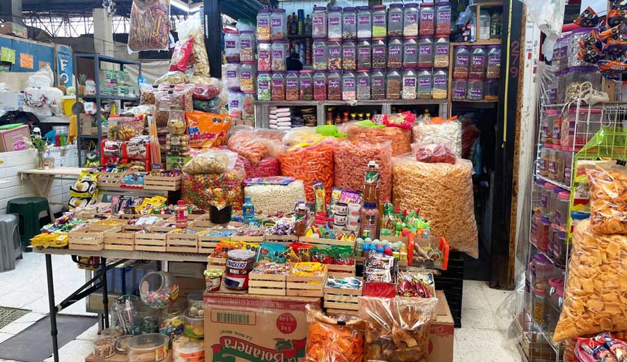 Different snacks on a snack booth in Mexico City market