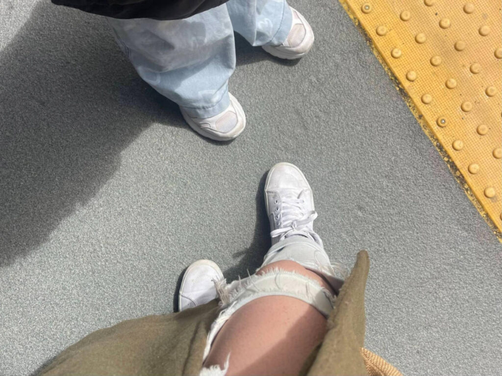 Closeup look of the white sneakers from above