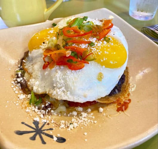A breakfast meal at Snooze A.M. Eatery