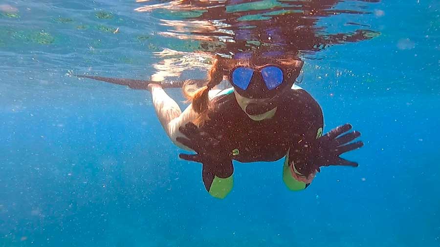 The author's wife snorkeling in Trunk Bay