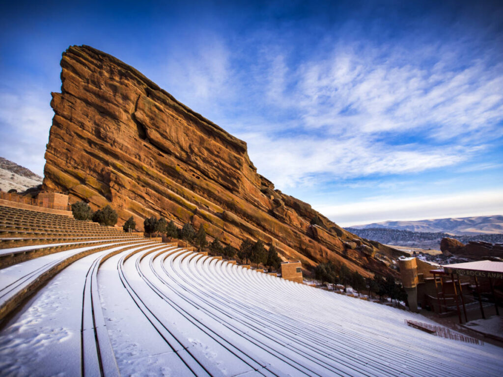 Picturesque view of the fresh layer of snow and the rock formation at Red Rocks