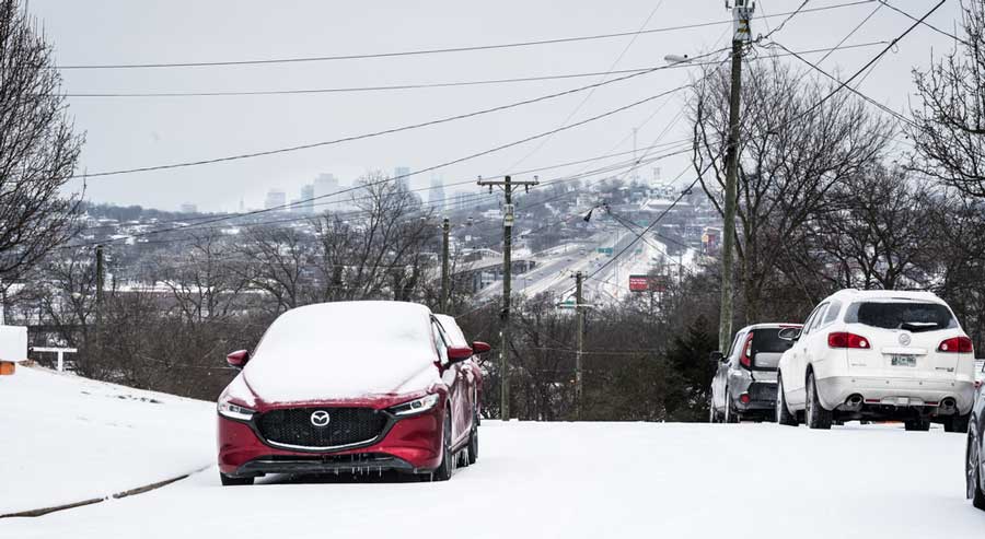Cars covered with snow in Nashville during winter season