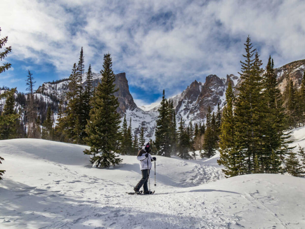 A man snowshoeing in Rocky Mountain National Park
