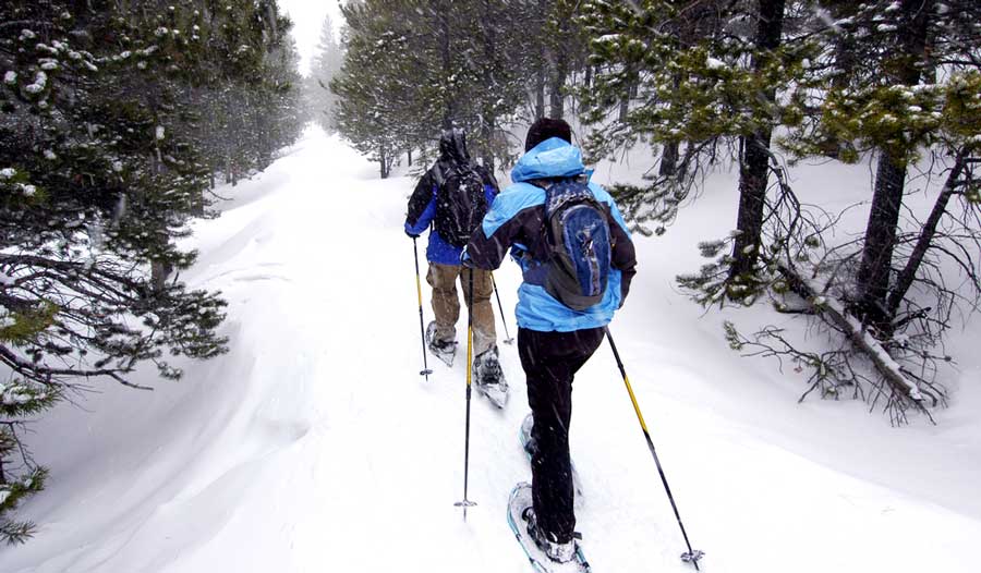A couple snowshoeing in Telluride during winter season