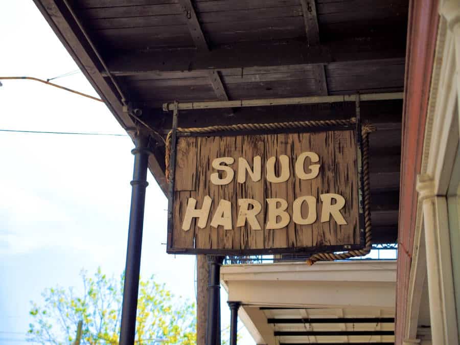 View of the hanging signage at the Snug Harbor Jazz Bistro