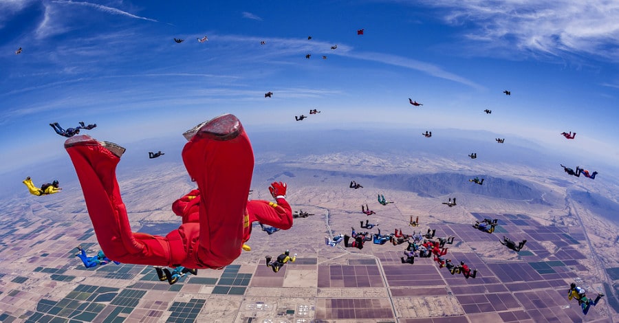 Panoramic view of skydivers above the Sonoran Desert.