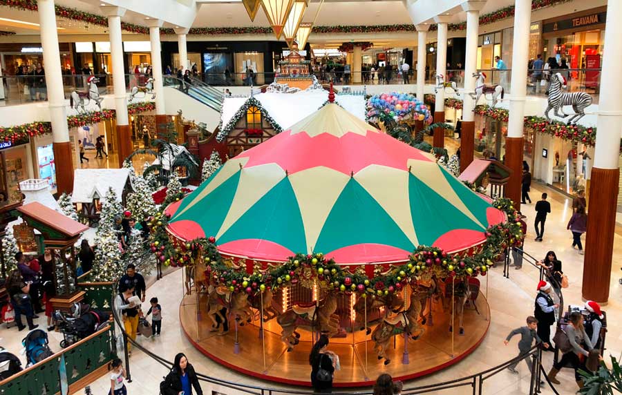 People wandering inside the South Coast Plaza