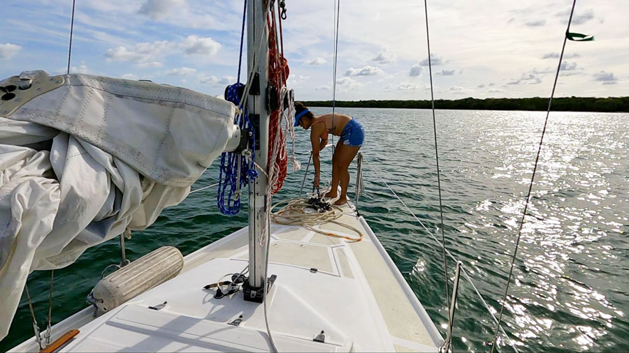 View of the author's wife sailing in South Florida Coast