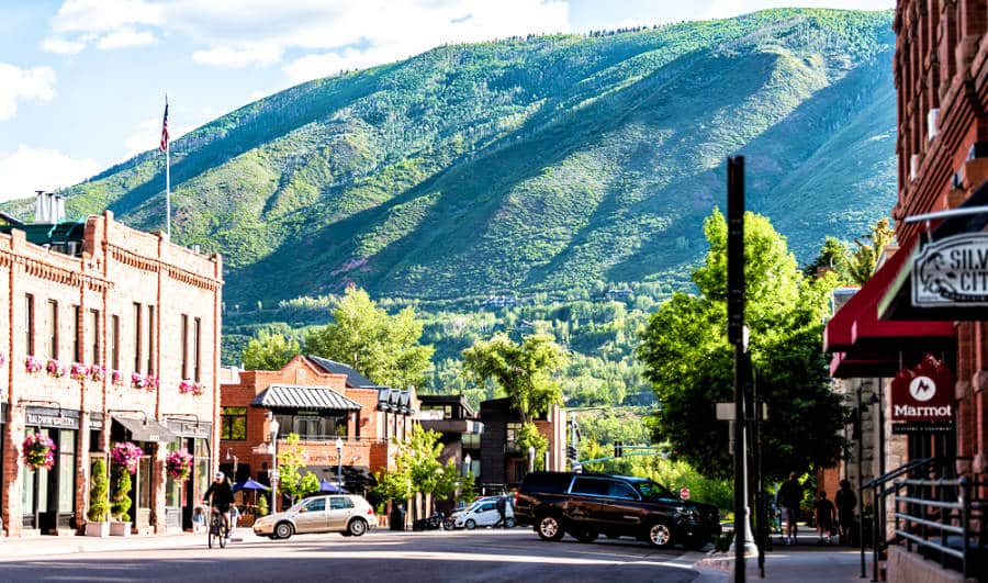 Sunny mountain view from the retro brick architecture on the South Galena street