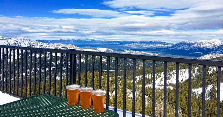 Glasses of beer on a table in South Lake Brewing Company with a view