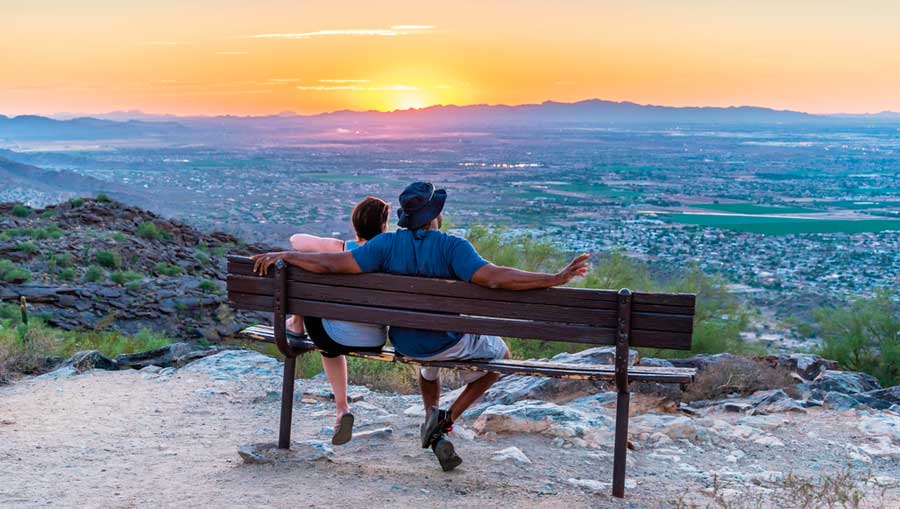 A couple watching the sunset in South Mountain Park