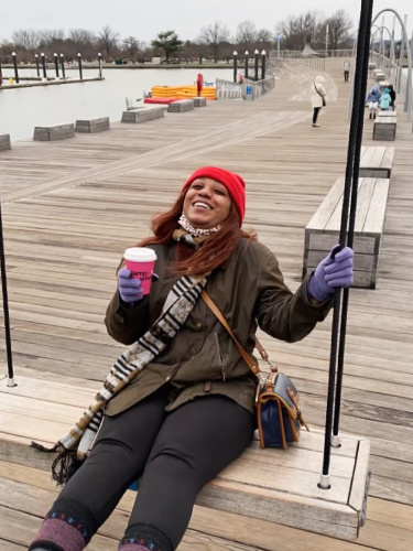 The author, Alexandria Taylor on a swing in Southwest Waterfront Park