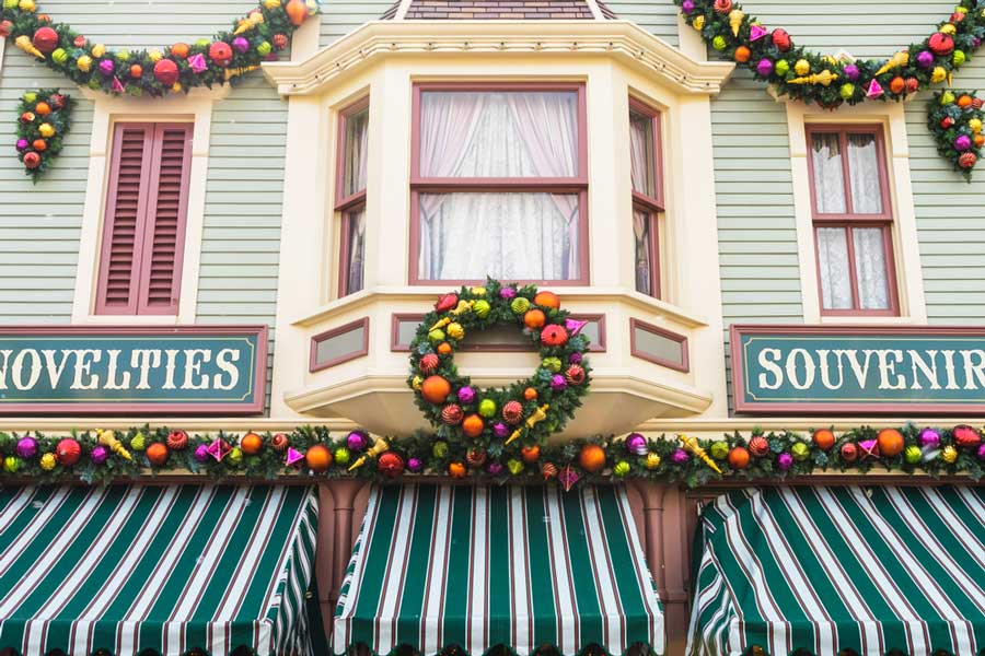A souvenir shop in Disneyland decorated on the outside during holiday season