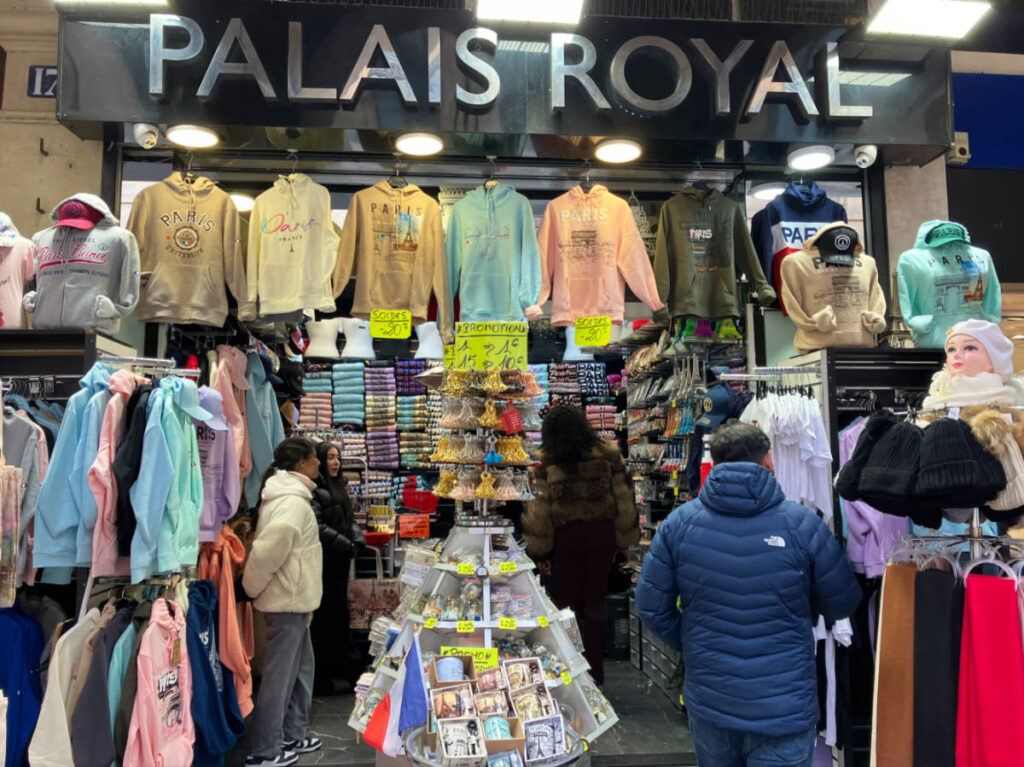 People looking for souvenirs at a souvenir shop in the 1st