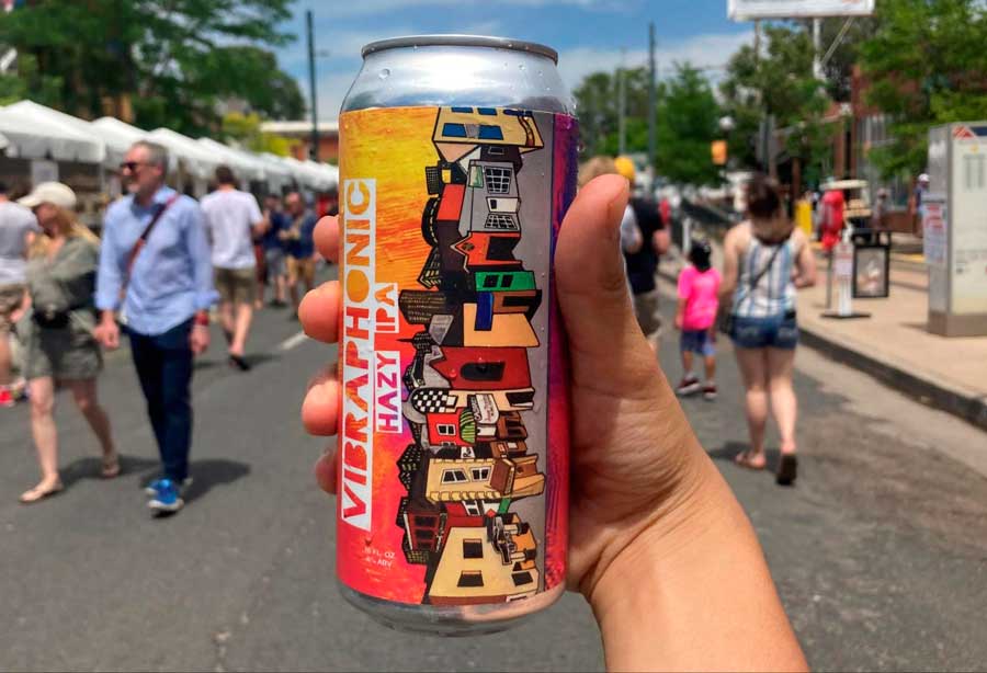 The author holding a canned beer from Spangalang Brewery