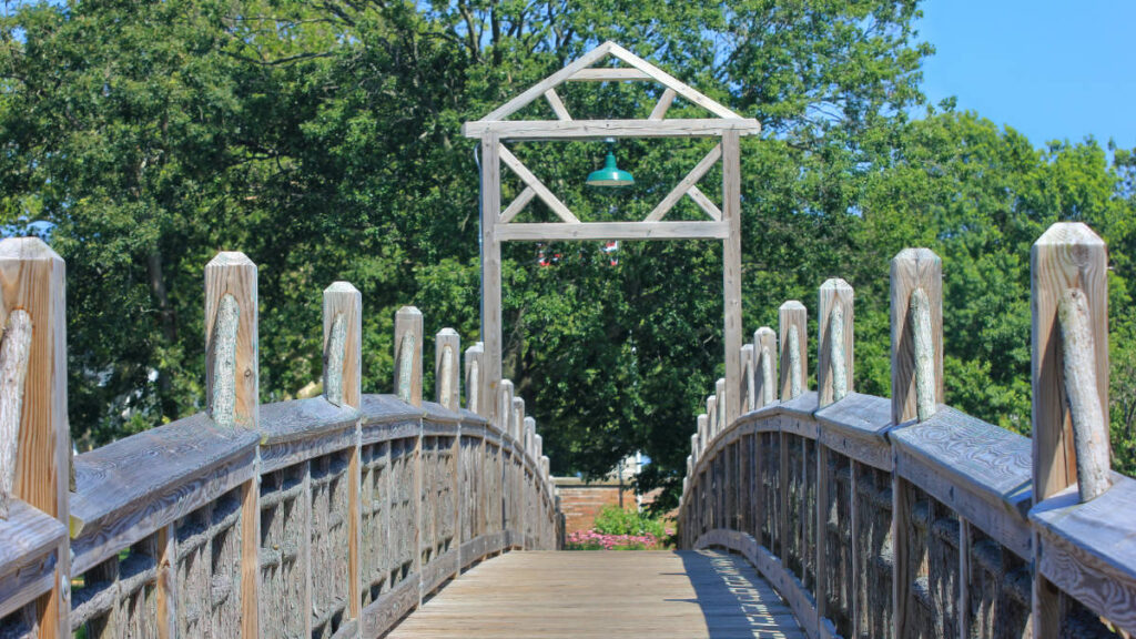 View of a footbridge under the clear blue sky in Spring Lake
