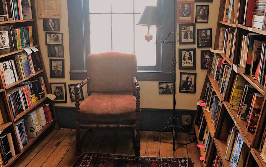 Book shelves and a chair inside Square Books