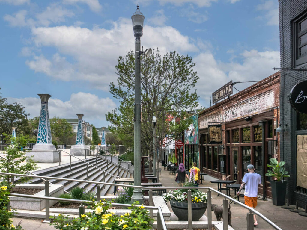 People wandering around the shops and restaurants at the Square in Downtown Decatur