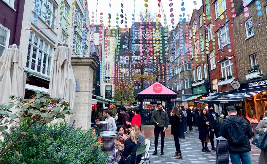 View of people wandering at St Christopher’s Place