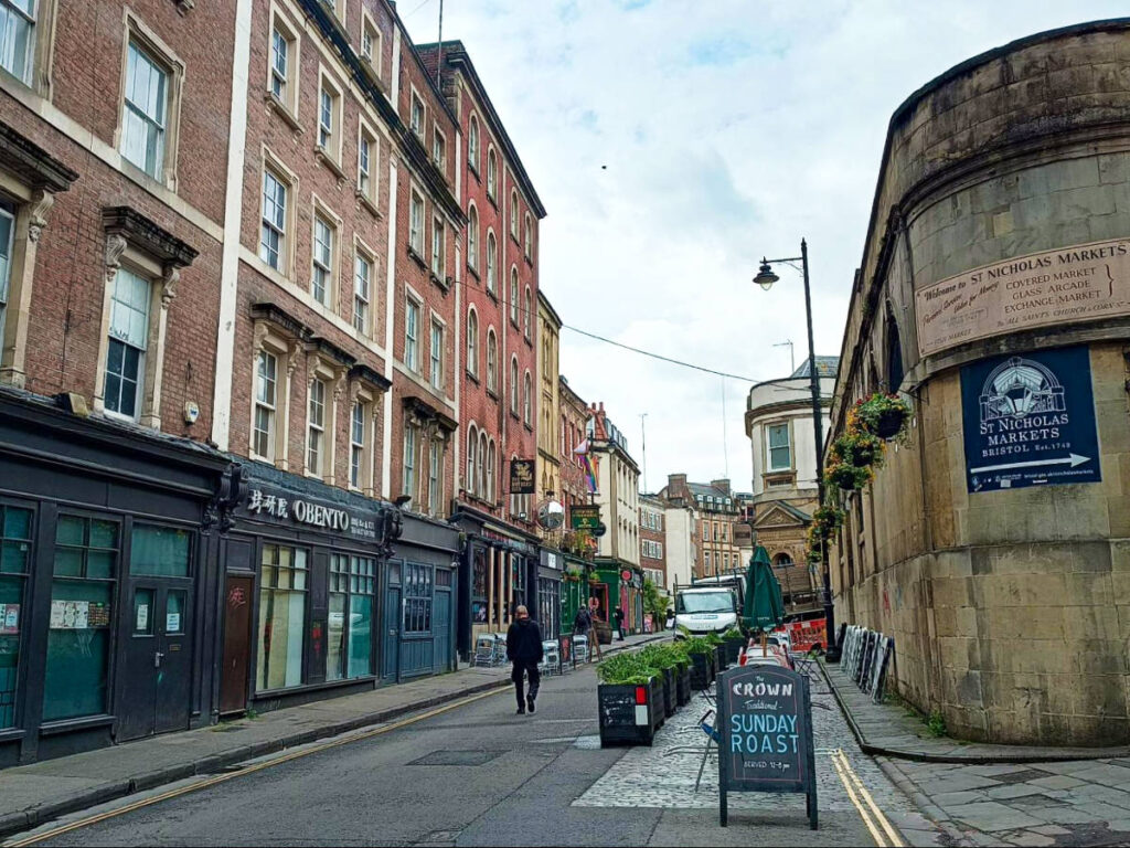 A man walking on the peaceful street of St Nicholas