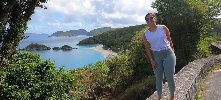 The author's wife posing for a photo with the overlooking view of St. John Island on her background