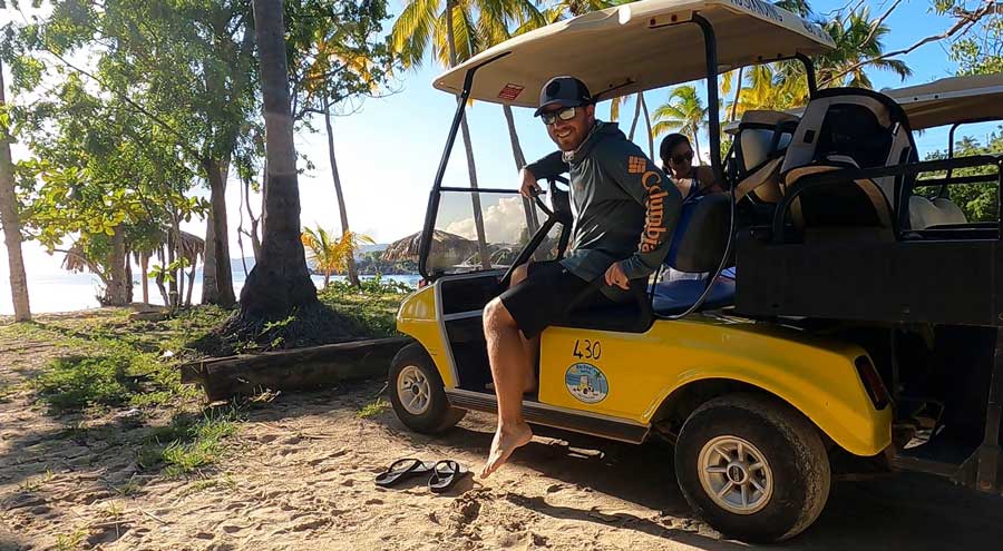 The author riding a golf cart in St. Thomas