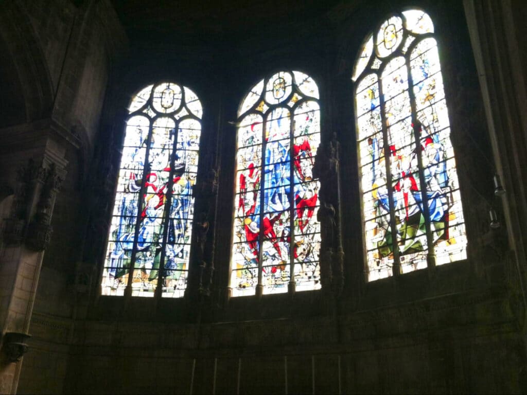 View of the stained glass windows inside the Abbaye-aux-Hommes in Caen