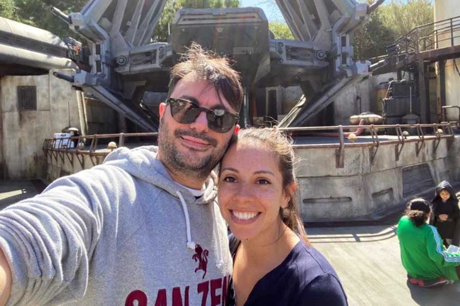The author's family members taking a selfie in front of the Star Wars Millennium Falcon