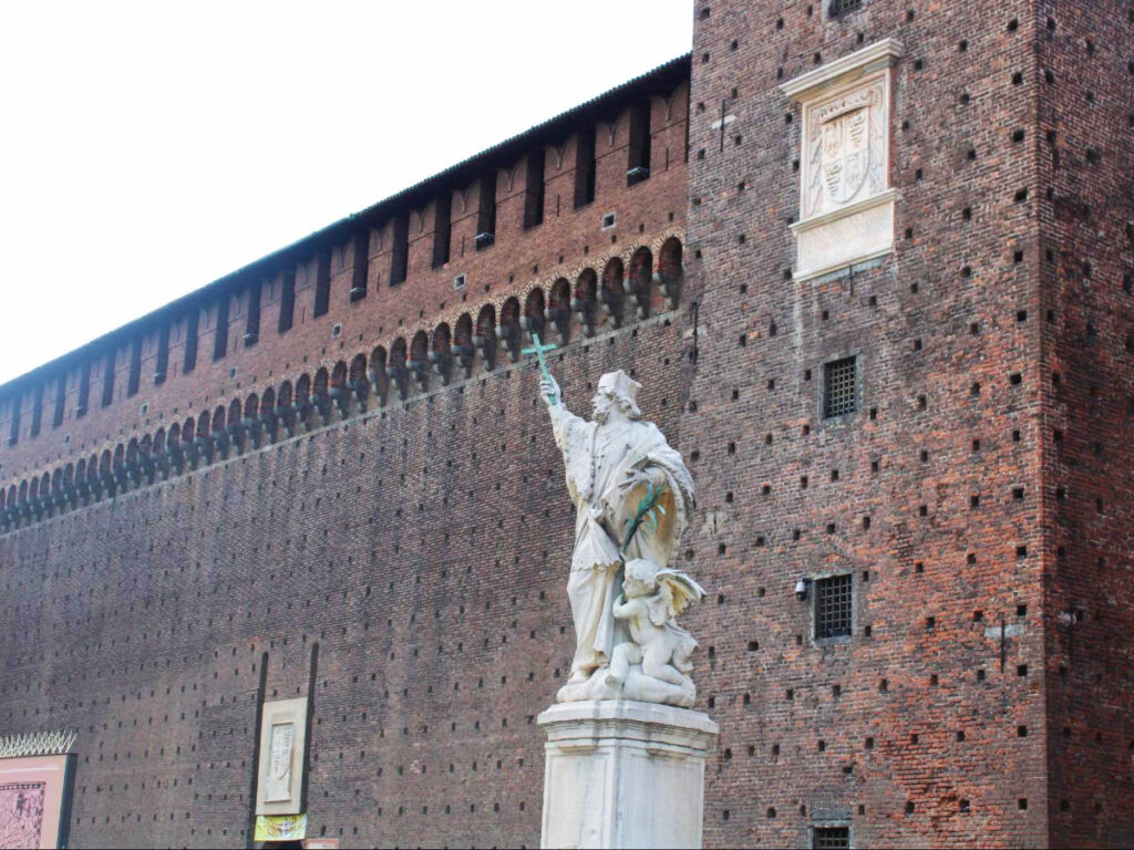 A statue outside the Sforzesco Castle in Milan