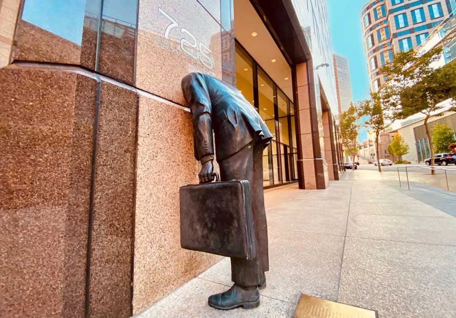 The Corporate head statue in front of FIGat7th