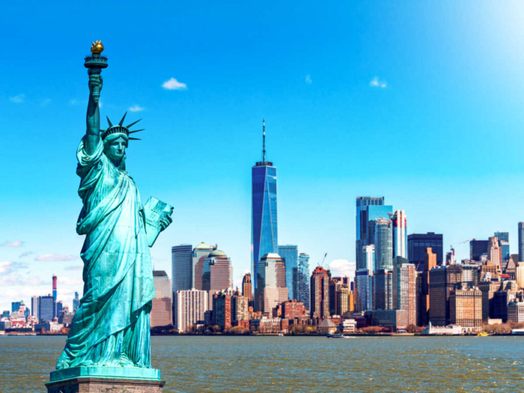 Panoramic view of The Statue of Liberty and the skyline of New York