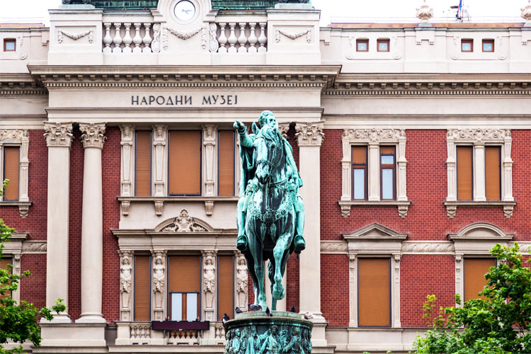Statue of Prince Michael and the National Museum at the Republic Square