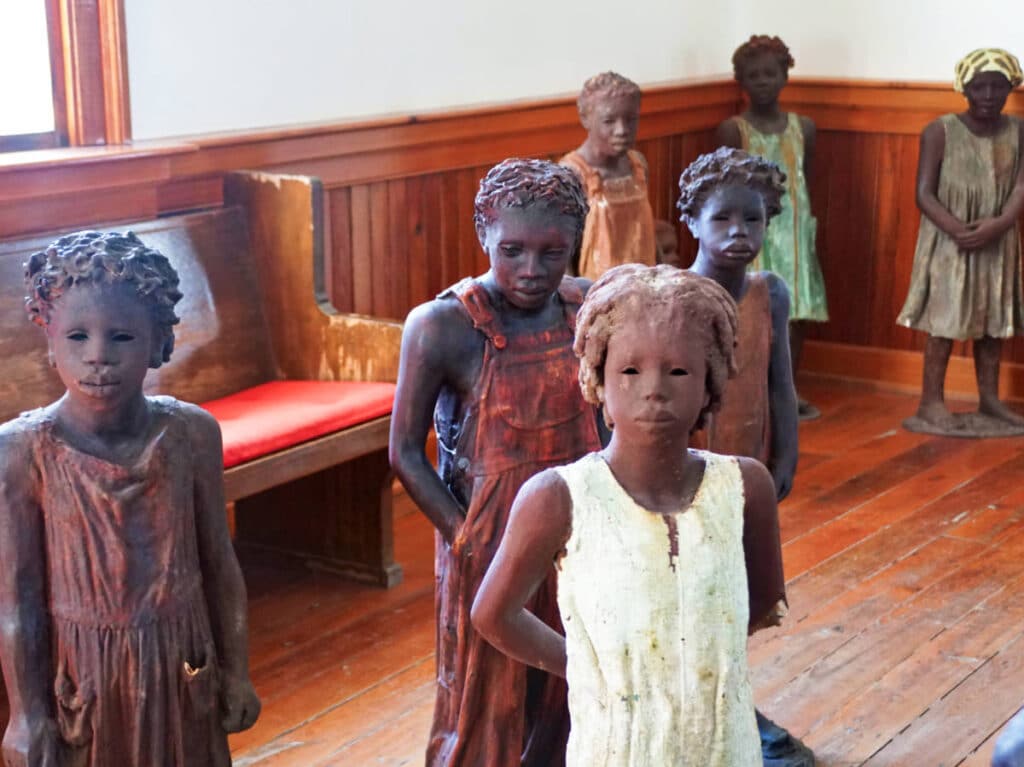 View of the statues of the children inside the Whitney Plantation
