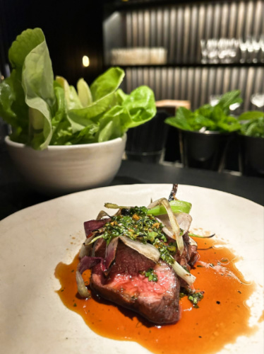 A plate with steak from TOMO