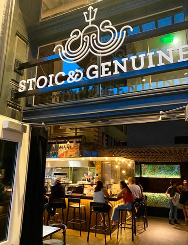People eating inside the Stoic & Genuine