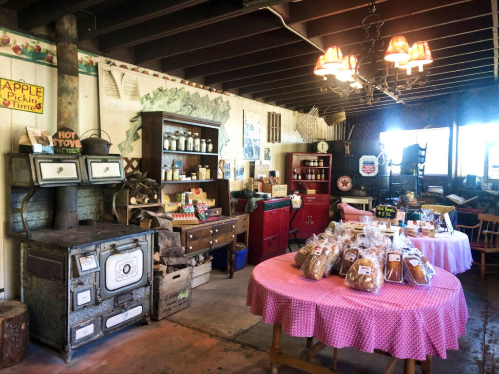 View of the displayed pastries on a table inside a store in Oak Glen